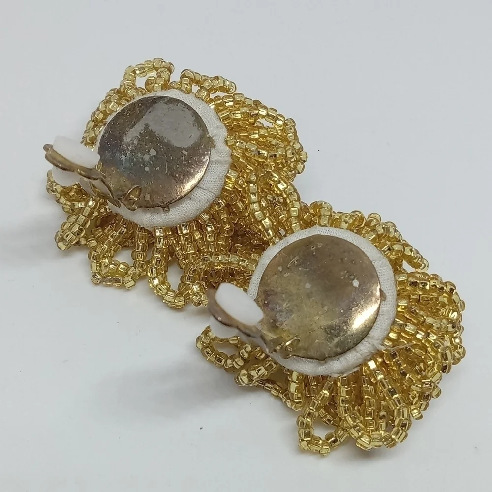 * vintage gold tone glass seed beads flower puff dramatic clip on earrings